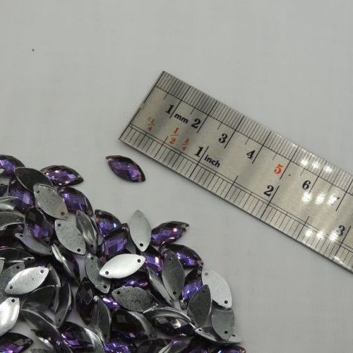 تصویر سنگ دوختنی رزینی   چشمی سایز دو