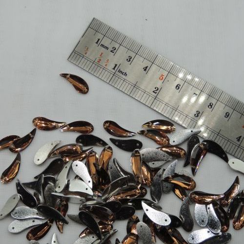 تصویر سنگ دوختنی رزینی جغه قهوه‌ای