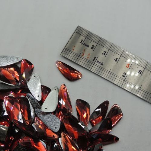 تصویر سنگ دوختنی رزینی  مثلث سایز دو 