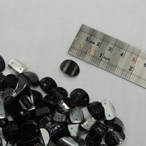 تصویر سنگ دوختنی رزینی بیضی محدب سایز سه 