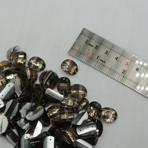 تصویر سنگ دوختنی رزینی  بیضی سایز سه 