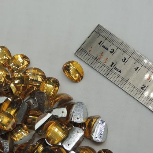 تصویر سنگ دوختنی رزینی بیضی محدب سایز سه