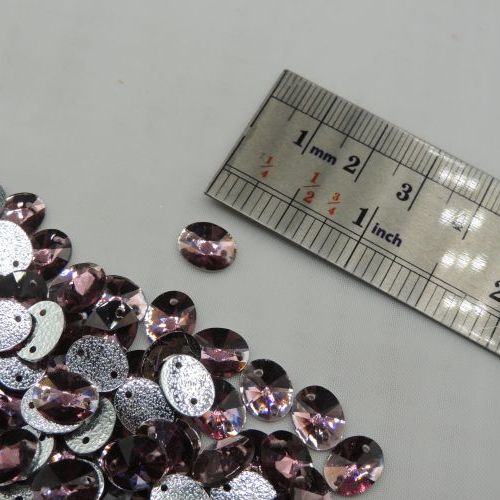 تصویر سنگ دوختنی رزینی بیضی سایز یک